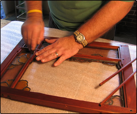 John Hamm, of Hamm Glass Studios, working on an	original	Greene	and 	Greene	piece